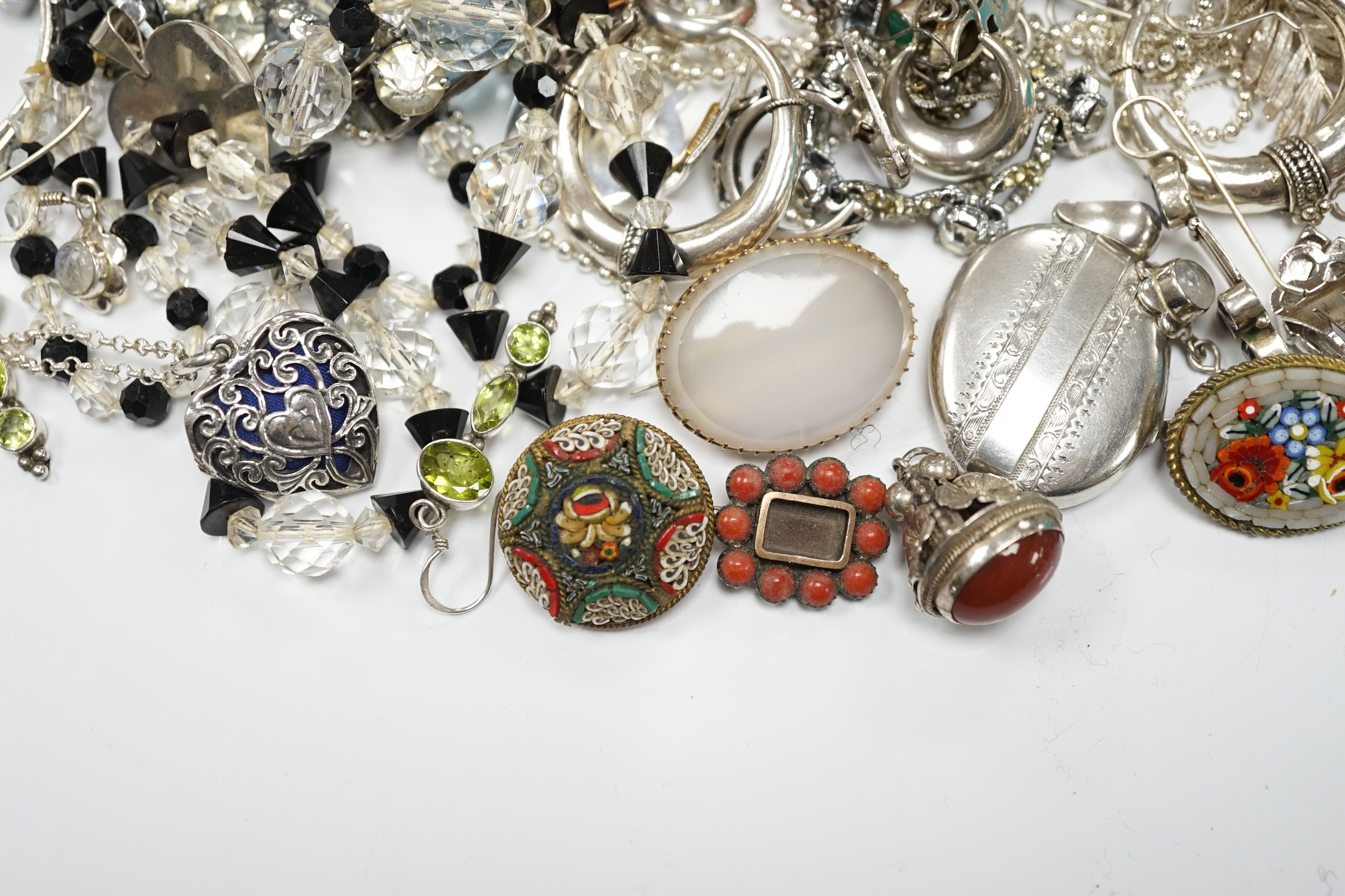 Sundry small silver including mounted glass toilet jars and a Georgian sifter spoon, together with assorted silver and other jewellery including earrings, pendants, brooches etc.